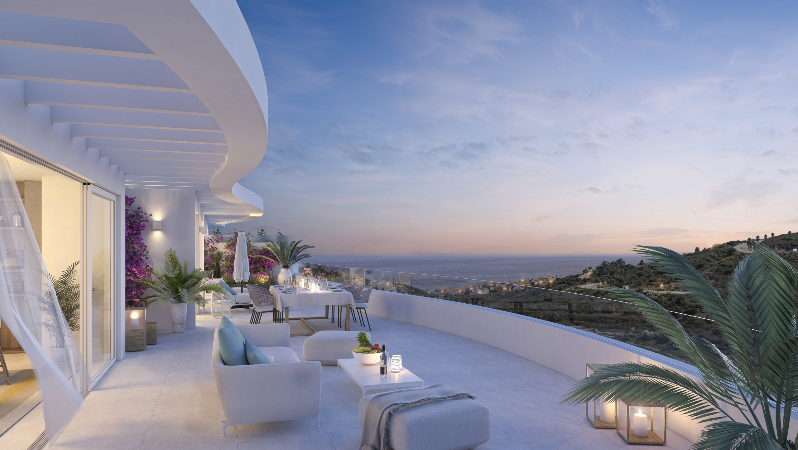 Atardecer en terraza de apartamento de lujo en venta sobre plano Serenity La Alcaidesa